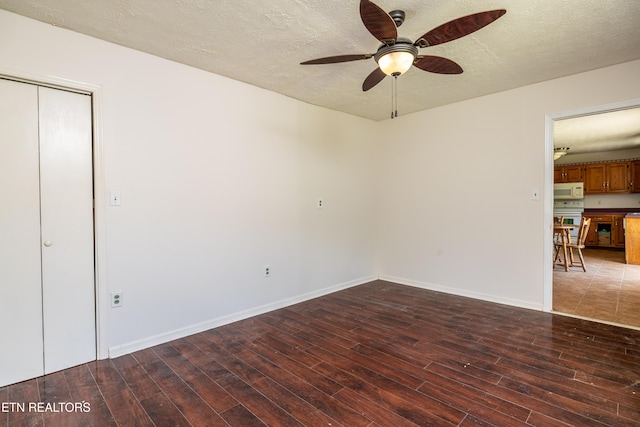709 Head Of Creek Rd, Sweetwater, TN 37874 - unfurnished room with wood finished floors, a ceiling fan, baseboards, and a textured ceiling