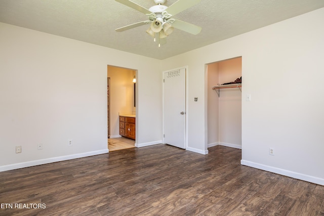 709 Head Of Creek Rd, Sweetwater, TN 37874 - unfurnished bedroom featuring wood finished floors, baseboards, a closet, connected bathroom, and a ceiling fan