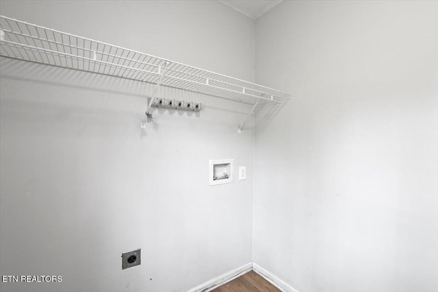 174 Sandy Hill Rd, Lafollette, TN 37766 - clothes washing area featuring hookup for an electric dryer, dark wood-style flooring, laundry area, hookup for a washing machine, and baseboards