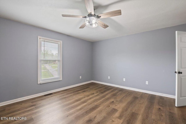 174 Sandy Hill Rd, Lafollette, TN 37766 - spare room featuring baseboards, visible vents, wood finished floors, and ceiling fan