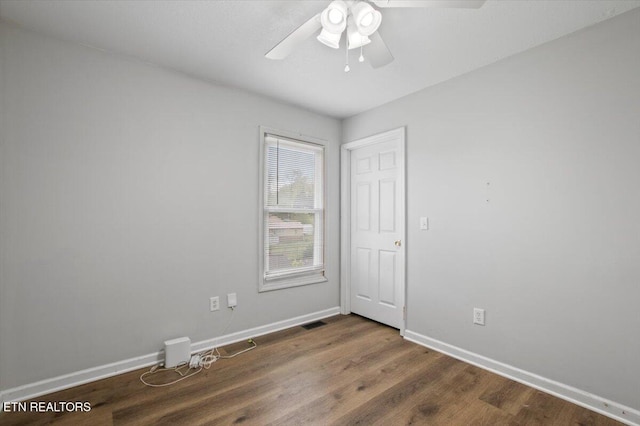 174 Sandy Hill Rd, Lafollette, TN 37766 - unfurnished room featuring wood finished floors, ceiling fan, visible vents, and baseboards