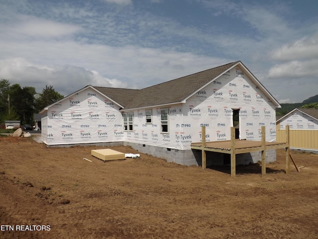128 Nevils St, Harrogate, TN 37752 - back of property with roof with shingles