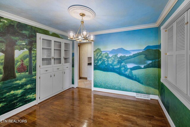 212 Douglas Ave, Sweetwater, TN 37874 - dining space featuring ornamental molding, visible vents, a chandelier, wood finished floors, and baseboards