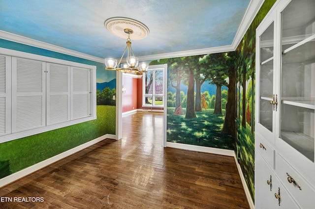 212 Douglas Ave, Sweetwater, TN 37874 - unfurnished dining area with ornamental molding, baseboards, a notable chandelier, and wood finished floors