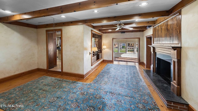 212 Douglas Ave, Sweetwater, TN 37874 - unfurnished living room with recessed lighting, wood finished floors, a premium fireplace, baseboards, and beam ceiling