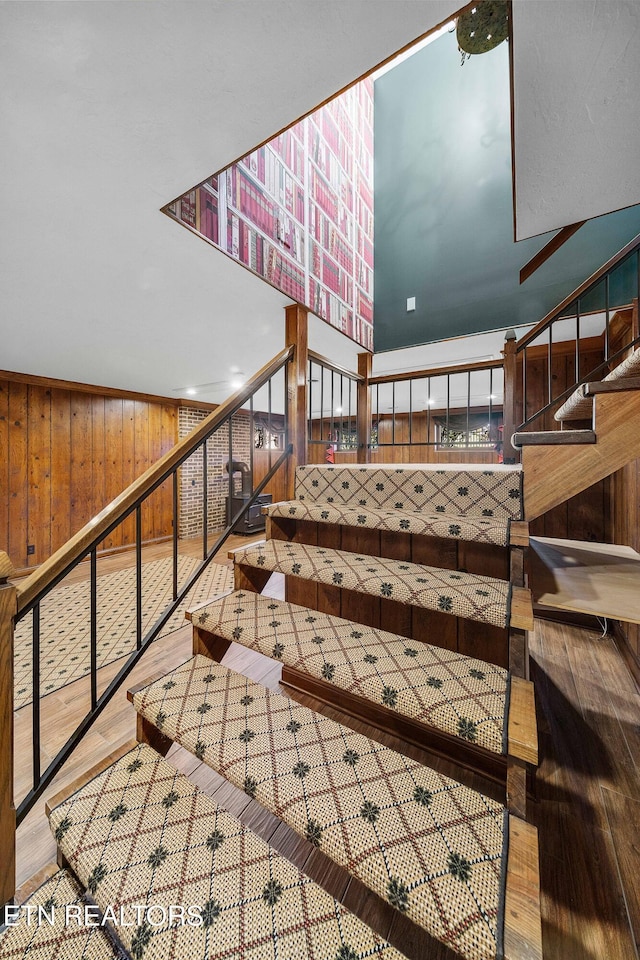 212 Douglas Ave, Sweetwater, TN 37874 - stairway with wooden walls and wood finished floors