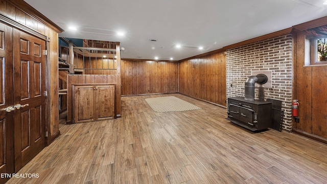212 Douglas Ave, Sweetwater, TN 37874 - interior space featuring wood walls, wood finished floors, and a wood stove