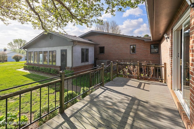 212 Douglas Ave, Sweetwater, TN 37874 - wooden deck with a yard and a sunroom