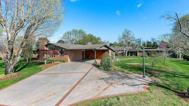 212 Douglas Ave, Sweetwater, TN 37874 - ranch-style house with a carport, a front lawn, brick siding, a chimney, and driveway