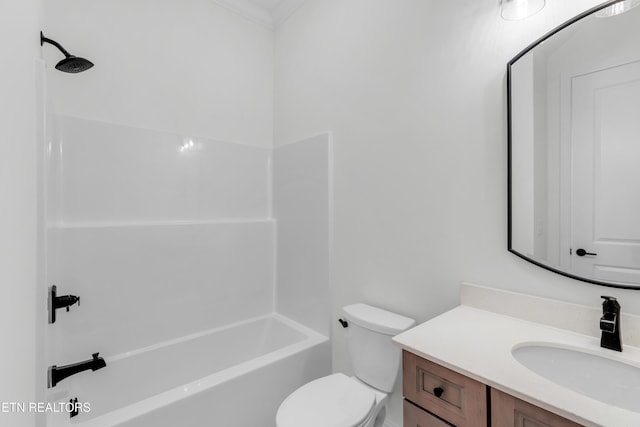 full bathroom with vanity, ornamental molding, bathtub / shower combination, and toilet