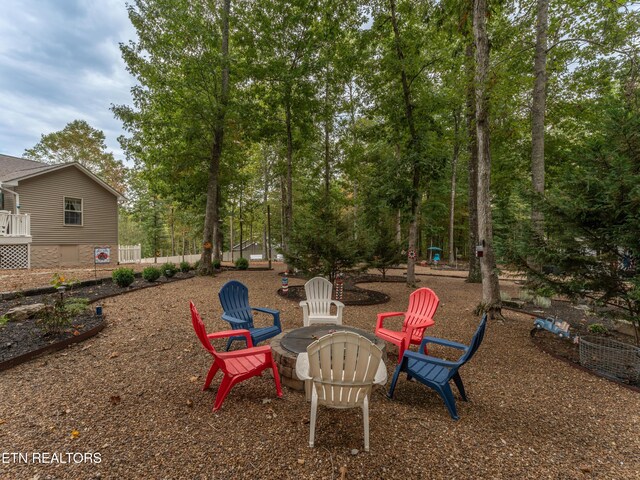 533 T Rd, Monterey, TN 38574 - view of yard featuring a fire pit and fence