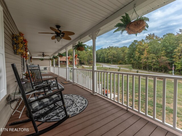 533 T Rd, Monterey, TN 38574 - wooden deck featuring a porch, a lawn, and ceiling fan