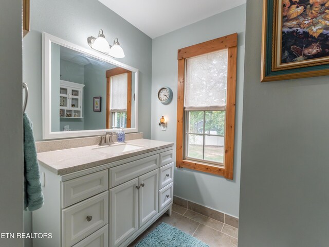 533 T Rd, Monterey, TN 38574 - bathroom featuring baseboards, tile patterned flooring, and vanity