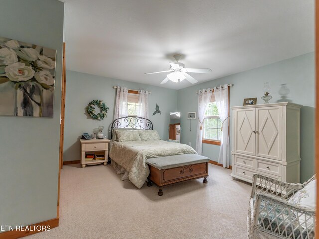 533 T Rd, Monterey, TN 38574 - bedroom featuring a ceiling fan, light colored carpet, baseboards, and multiple windows