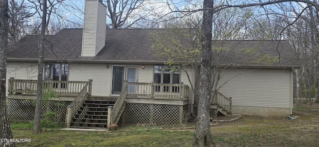 139 Fairhaven Dr, Crossville, TN 38558 - rear view of house featuring stairway, a deck, a chimney, and a shingled roof