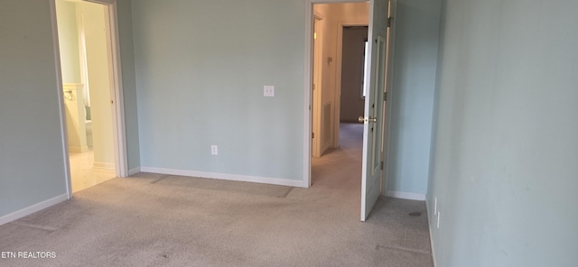 139 Fairhaven Dr, Crossville, TN 38558 - unfurnished bedroom with light carpet, baseboards, and ensuite bath