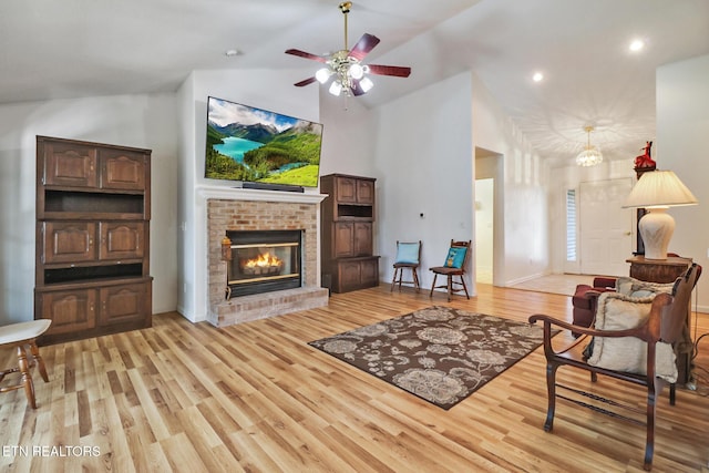 222 Pomeroy Dr, Crossville, TN 38558 - living area with recessed lighting, a ceiling fan, a brick fireplace, high vaulted ceiling, and light wood finished floors