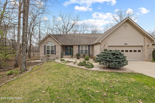 183 Trentwood Dr, Crossville, TN 38558 - ranch-style home with driveway, brick siding, a front lawn, a shingled roof, and a garage