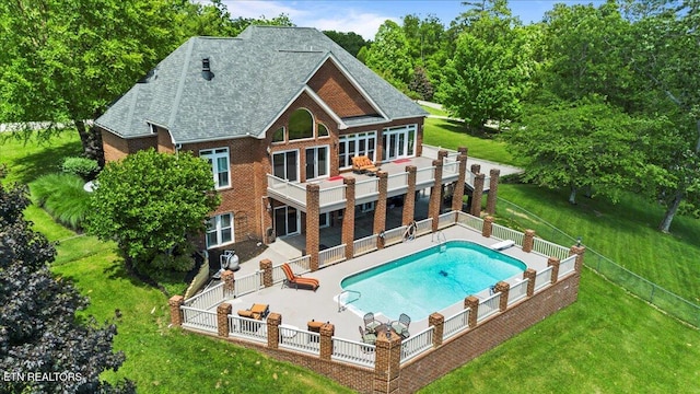145 Brave Dr, Oneida, TN 37841 - back of property with a patio, brick siding, and a deck