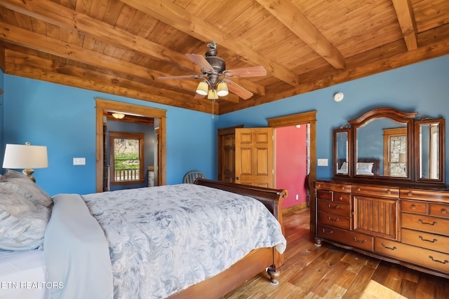 bedroom with beam ceiling, wooden ceiling, and hardwood / wood-style flooring