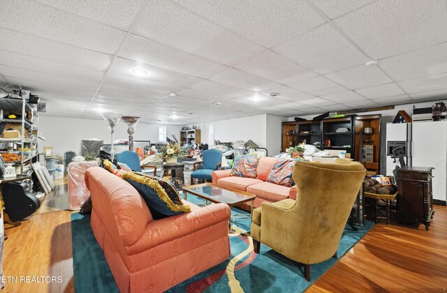 8207 Washington Pike, Corryton, TN 37721 - living area with wood finished floors and a paneled ceiling