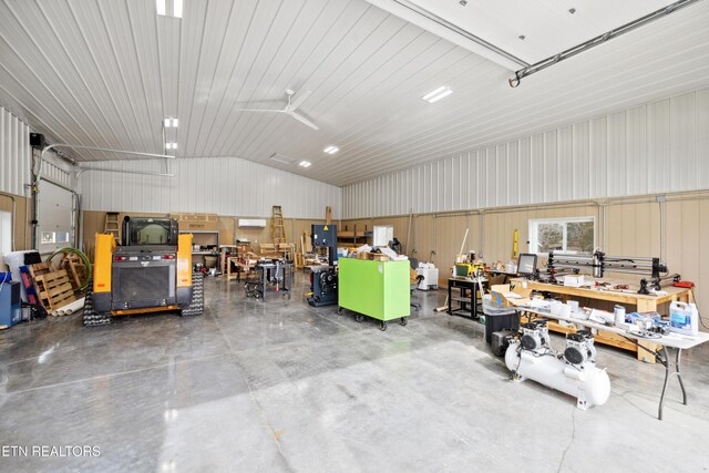 8207 Washington Pike, Corryton, TN 37721 - garage with a workshop area and metal wall