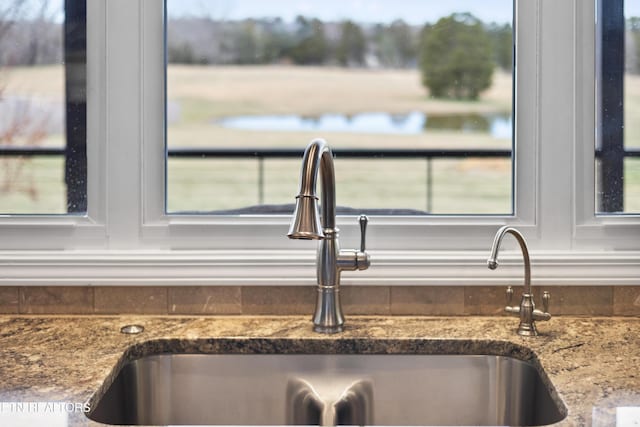 8207 Washington Pike, Corryton, TN 37721 - details with stone countertops and a sink