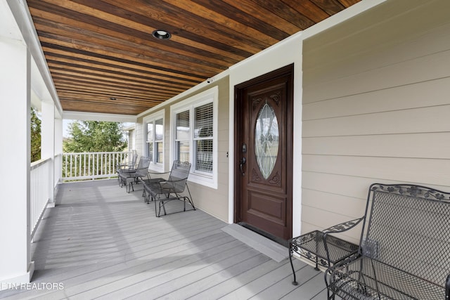 8207 Washington Pike, Corryton, TN 37721 - wooden terrace with a porch
