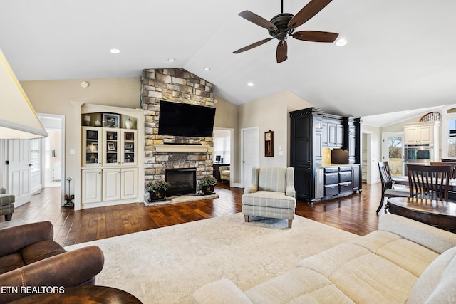 8207 Washington Pike, Corryton, TN 37721 - living room featuring dark wood-style floors, a fireplace, ceiling fan, and recessed lighting