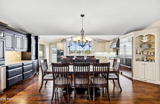 8207 Washington Pike, Corryton, TN 37721 - dining room with a chandelier, visible vents, vaulted ceiling, and dark wood finished floors