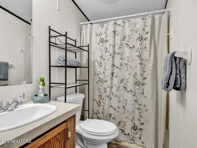 bathroom with crown molding, a textured ceiling, vanity, a shower with curtain, and toilet