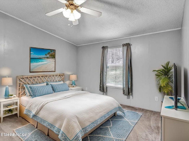 bedroom featuring ceiling fan, light carpet, crown molding, and a textured ceiling