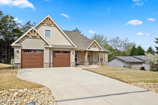 craftsman inspired home featuring stone siding, concrete driveway, a front yard, a shingled roof, and board and batten siding
