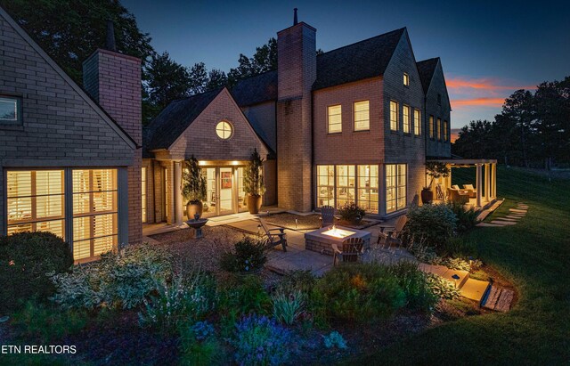 11901 S Fox Den Dr, Knoxville, TN 37934 - rear view of house featuring a fire pit, a patio area, a chimney, french doors, and a yard