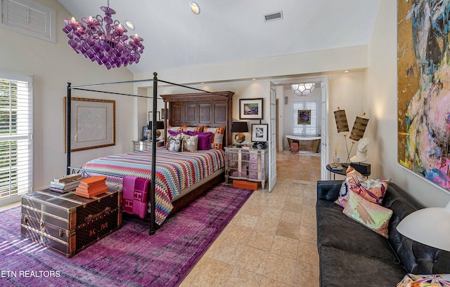 11901 S Fox Den Dr, Knoxville, TN 37934 - bedroom with a chandelier and high vaulted ceiling
