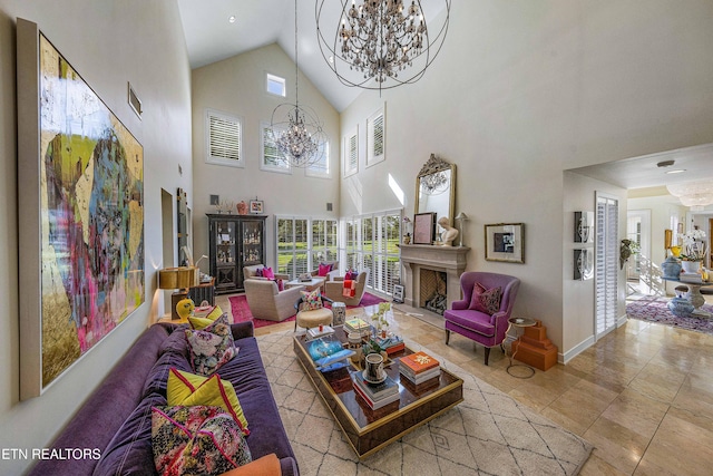 11901 S Fox Den Dr, Knoxville, TN 37934 - living room featuring a chandelier, high vaulted ceiling, a fireplace, baseboards, and tile patterned flooring
