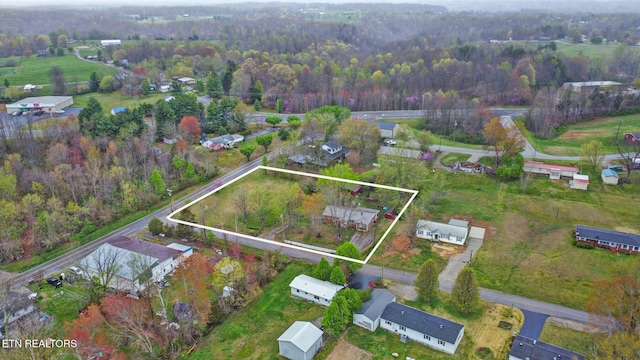107 Ford St, Byrdstown, TN 38549 - birds eye view of property featuring a wooded view