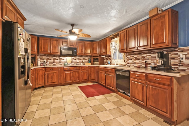 107 Ford St, Byrdstown, TN 38549 - kitchen with ceiling fan, black appliances, light countertops, and backsplash