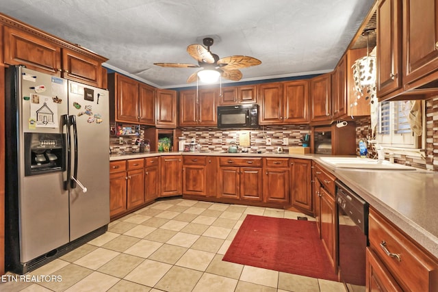 107 Ford St, Byrdstown, TN 38549 - kitchen with light countertops, dishwasher, black microwave, stainless steel refrigerator with ice dispenser, and backsplash