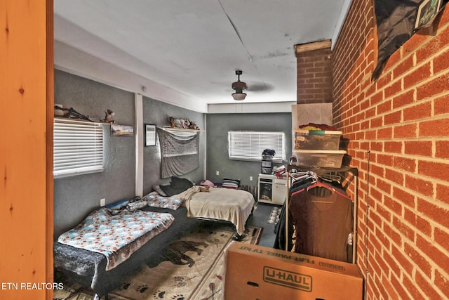 107 Ford St, Byrdstown, TN 38549 - bedroom featuring brick wall