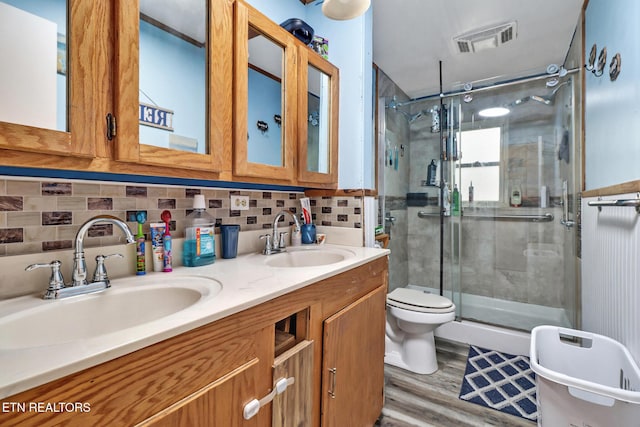 107 Ford St, Byrdstown, TN 38549 - bathroom with visible vents, a sink, toilet, and a shower stall