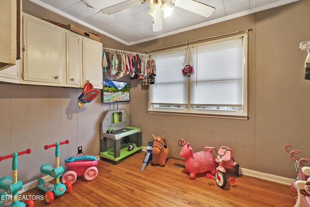 107 Ford St, Byrdstown, TN 38549 - recreation room with ornamental molding, baseboards, ceiling fan, and wood finished floors