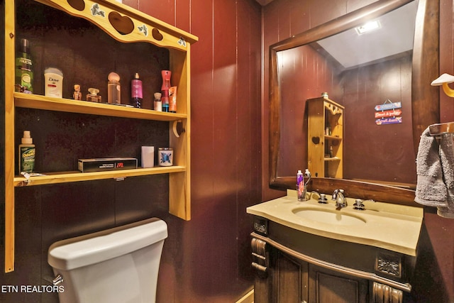 107 Ford St, Byrdstown, TN 38549 - half bath featuring toilet, vanity, and wood walls
