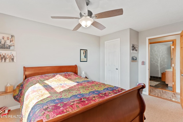 carpeted bedroom featuring baseboards and ceiling fan