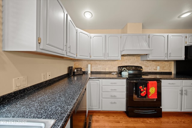 12 Wessex Ct, Crossville, TN 38558 - kitchen featuring white cabinetry, black appliances, custom exhaust hood, and light wood-type flooring