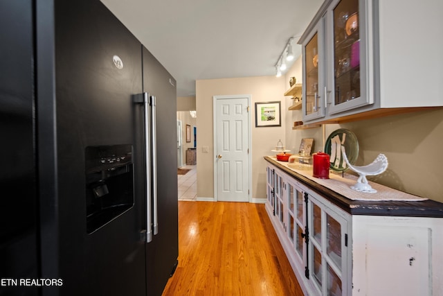 12 Wessex Ct, Crossville, TN 38558 - hall with light wood-style flooring, track lighting, and baseboards