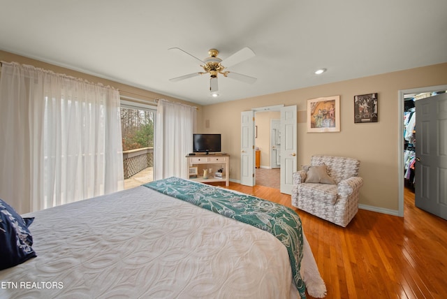 12 Wessex Ct, Crossville, TN 38558 - bedroom with access to exterior, wood finished floors, baseboards, ceiling fan, and recessed lighting