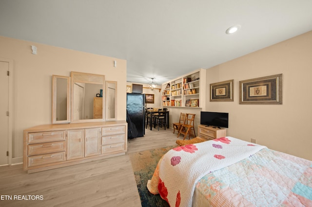 12 Wessex Ct, Crossville, TN 38558 - bedroom with freestanding refrigerator, light wood-style flooring, and recessed lighting