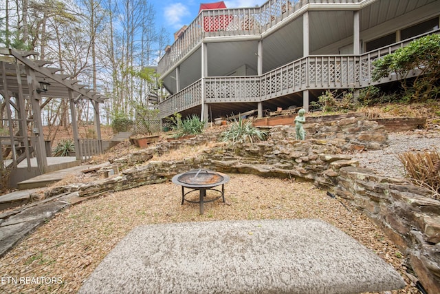12 Wessex Ct, Crossville, TN 38558 - view of yard featuring a fire pit and a wooden deck