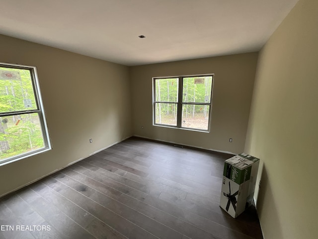 10 T Pl, Monterey, TN 38574 - empty room featuring dark wood-style floors